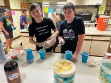 Landon Greene and Ian Greene help to make Rootbeer Floats. Submitted photo