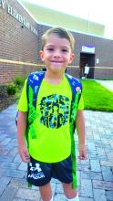 Anthony Griffus, of Dakota Dunes, was excited for his first day of kindergarten at Dakota Valley on Friday, August 18. Photo by Kelly Riibe • times2reporter@gmail.com