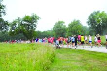 And they’re off for the 13th Annual “Be True to Your School” 5K at Adams Nature Preserve on August 5. Photos by Kelly Riibe • times2reporter@gmail.com