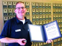 Marshall Hill is celebrating his 30th year with the United States Postal Service. He is currently the interim Post Master at the Elk Point Post Office. Photo by Beth Hutcheson • times1reporter@gmail.com
