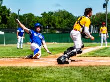 Ben Swatek slides safely home during the Salem/Montrose/Canova game on July 30 during the State B Tournament. All photos by Peterman Sports Photography • stevepeterman5@gmail.com