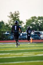 Jackson Boonstra runs the ball in for the first touchdown of the season against Vermillion Aug. 25.