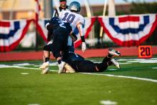 Charlie Margeas and Beau Jones go in for the 1-2 punch for a sack against Sioux Falls Christian Sept. 8. Photo by Peterman Sports Photography • stevepeterman5@gmail.com