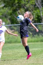 Grace Meyer stops the ball against Belle Fourche. Photo by Squier Designs