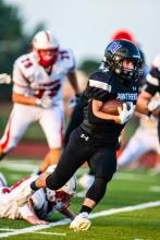 Charlie Margeas, pictured here against Vermillion, ran three times for 20 yards against Chamberlain Sept. 1. Photos by Peterman Sports Photography • stevepeterman5@gmail.com