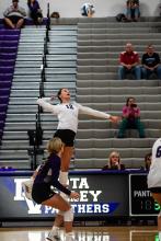 Claire Munch shows nice form as she goes up to spike the ball Sept. 5. Photos by Peterman Sports Photography • stevepeterman5@gmail.com