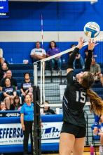Jacee Squier pushes the ball over the net in a sneak attack against the Elk Point-Jefferson Huskies Aug. 31. Photo by Peterman Sports Photography stevepeterman5@gmail.com