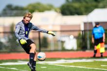 Bode Strong kicks the ball away from the net. Photo by Peterman Sports Photography stevepeterman5@gmail.com