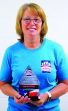 Union County Veteran Services Officer Lisa Schenzel holds the award she received as New Veteran Services Officer of the Year. Photo by Beth Hutcheson • times1reporter@gmail.com