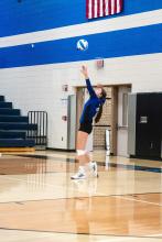 Ashley Brewer is a strong server for the Huskies.