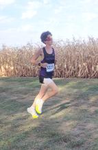 Cole Brown crossed the finish line in 1st place in the Boys JV race at the Alcester-Hudson Invite. Photo by Kelly Riiibe • times2reporter@gmail.com