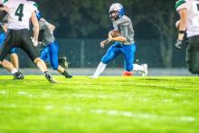 Quarterback Keaton Gale manuevered his way into the endzone against Flandreau. He also threw 2TD passes to Ashton Fairbanks. Photo by Peterman Sports Photography • stevepeterman5@gmail.com