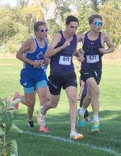 Mason Marx finds himself right behind two Dakota Valley Panthers during the DAK-12 Conference Meet in Vermillion Oct. 5. Photo by Kelly Riibe • times2reporter@gmail.com