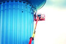 Contract welder, Doug Sommers works on attaching T-Mobile’s new 5G cellphone antenna to the Dakota Dunes water tower. Vinco was hoping to finish the project this week. Photo submitted by Gary Dickson