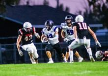 Jackson Boonstra broke the barrier many times to get 230 rushing yards for 2 touchdowns against Sioux Falls Christian. He’s pictured here against Lennox. Photo by Peterman Sports Photography • stevepeterman5@gmail.com