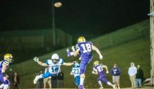 Garrett Merkley is all stretched out after he gets a partial block on Winner’s punt. Photo by Peterman Sports Photography • stevepeterman5@gmail.com