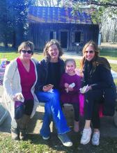 Dakota Dunes resident Marilee Pfeifer, along with her two daughters- in-law and granddaughter, enjoyed the weather and atmosphere at Adams Homestead and Nature Preserve on Nov. 11. Pictured from left are Marilee Pfeifer, Rochelle Pfeifer, Margot Pfeifer and Mary Pfeifer.See more photos on page 12. Submittedphoto