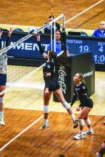 Emersen Mead uses a soft touch to put the ball over the net during the opening round in the State Class A Volleyball Tournament against Rapid City Christian Nov. 16 in Rapid City. Photo by Peterman Sports Photography stevepeterman5@gmail.com
