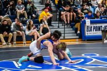Jackson Boonstra grapples with Ayson Rice of Canton in the championship match in the 150 bracket. Boonstra ended up in 2nd place at the Husky Invite Dec. 16.