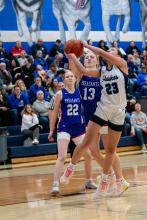 Paige Jacobs goes in for 2 against the Parker Pheasants Dec. 14. She scored 4 points during the game. Photo by Peterman Sports Photography stevepeterman5@gmail.com