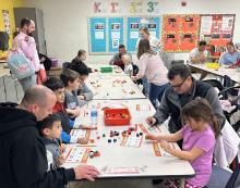 Dakota Valley Elementary School students and parents attend Family Math Night on Nov. 16. Pictured above, parents and children play Bingo inside one of the classrooms. Submitted photo