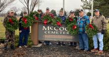 Members of the North Sioux City Two Rivers American Legion Post 319 placed Christmas wreaths on veterans’ grave at the McCook Cemetery. Pictured are, from left, John Graser, Doug Carter, Jim Nolen, Dave Roepke, Ruben Hauser, Dave Young, Doug Jansen and Larry McCaslen. The post members also placed wreaths on gravesites at the Civil Bend Cemetery. Submitted photo