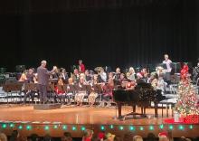 Band Director Daryl Jessen conducted the seventh and eighth grade band on Dec. 7 in Dakota Valley’s Performing Arts Center. Photo by Kelly Riibe • times2reporter@gmail.com