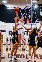 Emersen Mead blew past the Tea Area defenders Dec. 8 to score a quick lay-up for the Panthers. Photo by Peterman Sports Photography • stevepeterman5@gmail.com