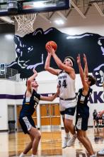 Luke Bruns pulls up for a jump shot against Tea Area Dec. 8. He recorded 24 points in the boys’ season opener. Photo by Peterman Sports Photography • stevepeterman5@gmail.com