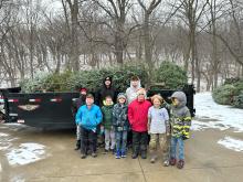 Scouts collected used Christmas Trees in Dakota Dunes and the surrounding areas on Saturday, Jan. 6. Approximately 50 trees were collected for Dorothy Pecaut Nature Center, which will recycle the trees into mulch in the Spring for their hiking trails. Pictured are, from front left, Blake Winters, Carter Hunt, Gavin Carlson, Tucker Winters, Jaxson Norton and Graham Carlson; and back, Ray Taylor-Smith, Maycen Taylor-Smith and Jimmy Taylor-Smith. Submitted photo