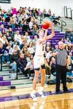 Grant Van Den Hul finds himself open in the corner and goes up for the 3. Photo by Peterman Sports Photography stevepeterman5@gmail.com