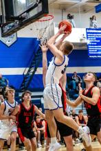 Ashton Fairbanks goes up for 2 of his 7 points against Dell Rapids Jan. 6. Photo by Peterman Sports Photography stevepeterman5@gmail.com