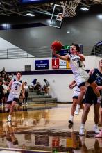 Charlie Margeas goes in the for lay-up against Elk Point-Jefferson Feb. 1. Photo by Peterman Sports Photography stevepeterman5@gmail.com