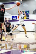 Logan Collette flies to the basket to garner 2 of his 14 points against Vermillion Feb. 6. Photo by Peterman Sports Photography stevepeterman5@gmail.com