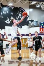Dylan Lukken flies toward the hoop. Photos by Peterman Sports Photography • stevepeterman5@gmail.com