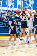 Kayden Moore hits traffic and is fouled on his way to the basket against Tea Area Feb. 16.