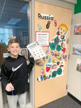 Jack Galles, of Dakota Dunes, found Russia during the scavenger hunt for STEM night. Classroom doors were decorated to represent different countries and students were on a mission to find the ones that corresponded with their STEM activity sheet.