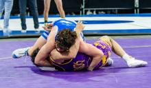 Gunner Ewing wrestles Jude Sargent of Winner Area. Ewing won by fall in 3:34 and brought home an 8th place finish from the state tournament Feb. 22-24.