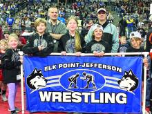 The Elk Point-Jefferson Youth Wrestling members participated in the Parade of Champions. Pictured are, from left, Karoline Kluender, Ryker Johnson, Audyn Otkin, Josie Hutcheson and Elena Hutcheson; and back, Coaches Danny Hutcheson and Tyler Chicoine. Submitted photo