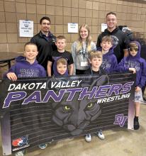 State qualifiers and members of the Panther Wrestling team marched in the Parade of Champions on Sunday, March 17 in Rapid City. Pictured are, from front, left, Henry Reis, Leo Riibe, Leif Dewald and Matias Smith; and back, Coach Adrian Jurado, Konnor Rasmussen, Kenzie Scott, Graham Riibe and Coach Nic Madsen.