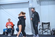 DV Track Coaches Tammy Lilly gives Silja Gunderson a hug and James Schmit congratulates her after she won the 60m dash at Mount Marty. Gunderson also took 1st in the 60M hurdles on March 21. Photo by Kelly Riibe •times2reporter@gmail.com