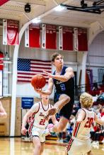 Garrett Merkley soars to the hoop against Vermillion Feb. 27. Photos by Peterman Sports Photography • stevepeterman5@gmail.com