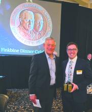 Kirk Ferentz, a presenter at the formal dinner, stands next to Ben Linden. Linden received the Hancher Finkbine medallion on April 16. Submitted photo