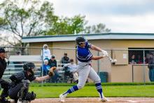 Jace Shatswell connects in the game against Dakota Valley. Photo by Peterman Sports Photography • stevepeterman5@gmail.com