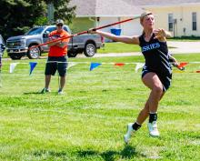 Bentlee Kollbaum throws the javelin May 14 at the Huskies home meet. Photo by Peterman Sports Photography • stevepeterman5@gmail.com