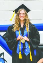 Avery Norris Valedictorian smiles while presented during the Elk Point-Jefferson graduation ceremony May 18, 2024. Photo by Peterman Sports Photography • stevepeterman5@gmail.com