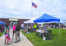 It was a great day for the North Sioux City Community Library on Tuesday, June 4 as they kicked off their summer ready program with a big community party. Many attended and were able to play games, enjoy lunch, slide down water inflatables and eat snow cones.