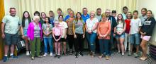 Friends Feast was held July 8 from 5:30-7:00 P.M. at Immanuel Lutheran Church. Dakota Alert, a local business owned by the Quam family, provided the meal of ham, cheesy potatoes, mixed vegetables, dinner roll, and strawberry shortcake. Approximately 30 employees and friends of Dakota Alert prepared and served the meal. Friends Feast is a monthly meal free to everyone. Various local businesses and organizations provide the food and workers. Immanuel Lutheran Church provides the venue. Submitted photo
