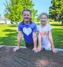 These two campers from left, Norah Markve and Evelyn Blaeser, were excited to spend the morning with others their age at the Habitat Happenings nature camp.