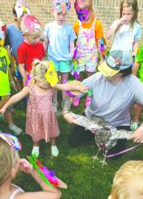 Elk Point Library held bird week. They made bird wings and masks and wore them to see the unique visitors. They also held bird races. Cassandra Schmith shared her feathered friends with the children. Submitted photos